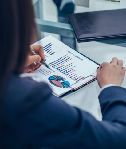 closeup of business team discussing financial charts on a workplace in a modern office